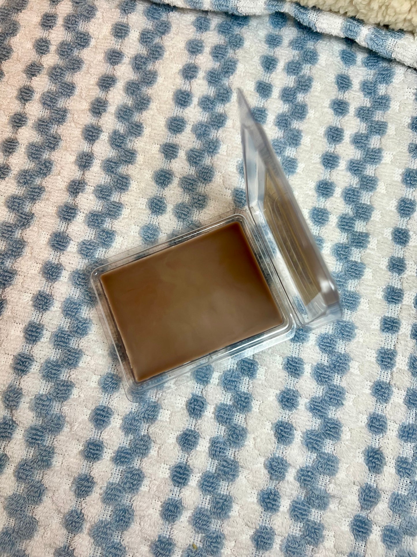 a cup of Luke’s coffee wax melts